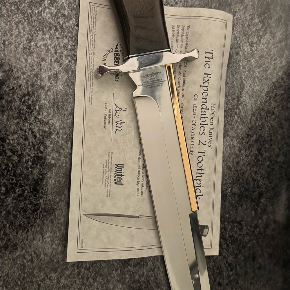 Silver and Brown Toothpick Knife